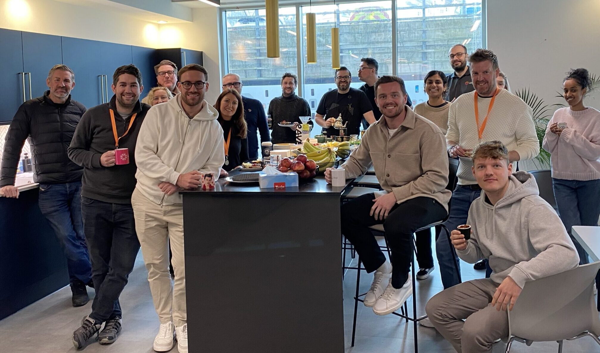 Some of the Ideal team gathered in the kitchen in the Ideal offices.